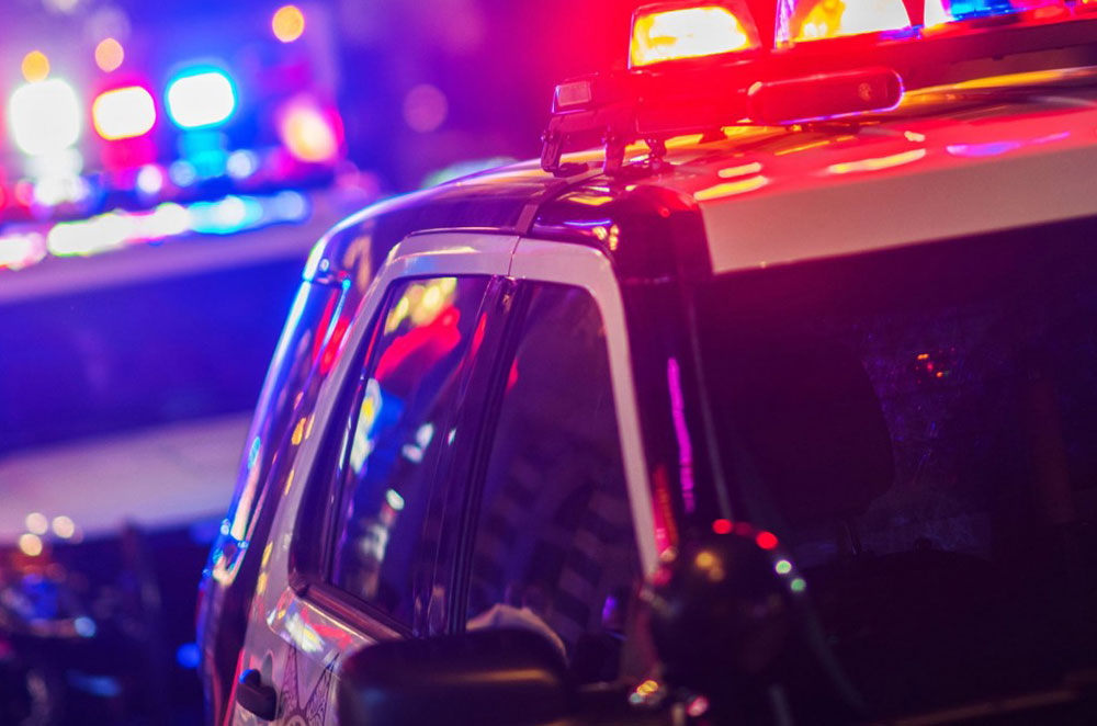 two police cars at night